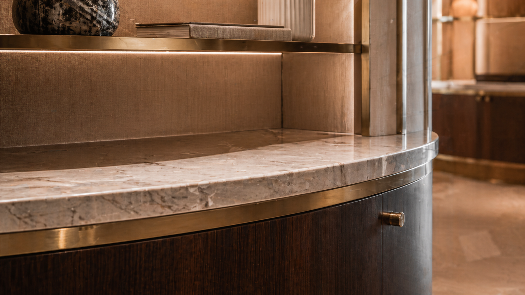 Close-up of premium joinery, stone and brass detailing